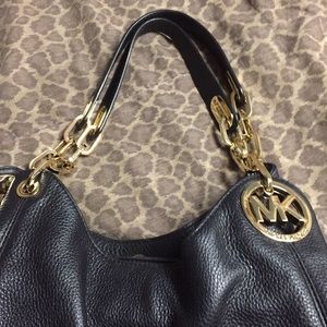 Micheal kors authentic firm on price new!!